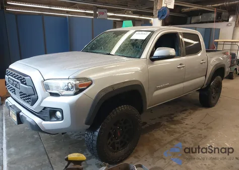 2018 Toyota Tacoma Trd Off Road z USA, uszkodzony, nr VIN 3TMCZ5AN5JM181797